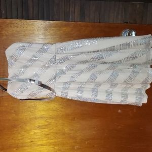 Strapless sequin pattern dress.